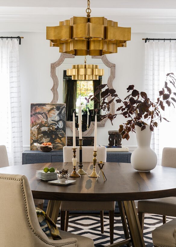 Layered dining room by R. Jane Morgan Interior + Design showing full-service interior design with custom lighting, art, furnishings, and collected styling in a Chicago-area home